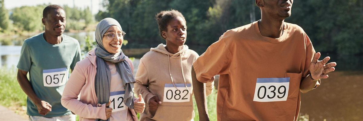 Group of men practicing endurance outdoor in Uzhhorod park