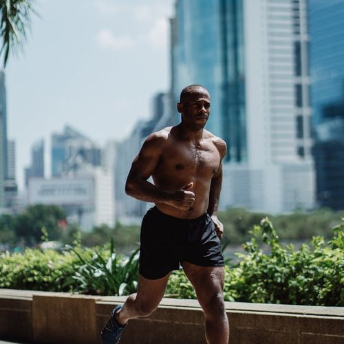 Man feeling energetic after morning strength routine